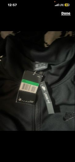 Nike Tracksuit Top jacket size xl two pockets with zippers and two pockets inside brand new with tag