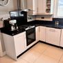 Whole Kitchen, including cabinets, granite countertops, appliances, oven hood, sink and tap Image 6
