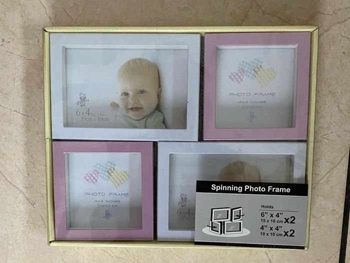 NEW SEALED Spinning Photo Frame - 4 pictures