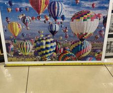 large framed jig saw of hot air balloons