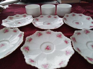 Six Pretty China Saucers