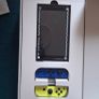 Nintendo switch in box with acceseries and game Image 2