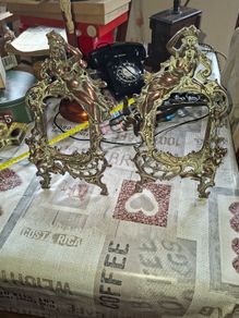 Beautiful Pair of Antique Art Nouveau Beatrice. Bronzed Photo Frames Cherub. a stunning lady lies on the top of the frame with beautiful scrollwork descending down the frame to a winged Cupid or Angel