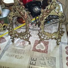 Beautiful Pair of Antique Art Nouveau Beatrice. Bronzed Photo Frames Cherub. a stunning lady lies on the top of the frame with beautiful scrollwork descending down the frame to a winged Cupid or Angel