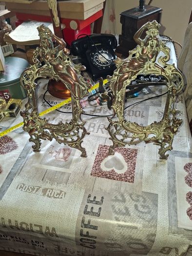 Beautiful Pair of Antique Art Nouveau Beatrice. Bronzed Photo Frames Cherub. a stunning lady lies on the top of the frame with beautiful scrollwork descending down the frame to a winged Cupid or Angel