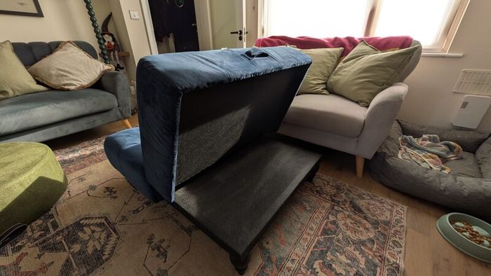 Navy footstool/ottoman from Next. Good condition. Material has rip so needs repair or reupholstery.