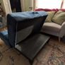 Navy footstool/ottoman from Next. Good condition. Material has rip so needs repair or reupholstery. Image 4