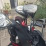 2 golf bags and various  club also jackets balls and tees shoes  and a trolly Image 7