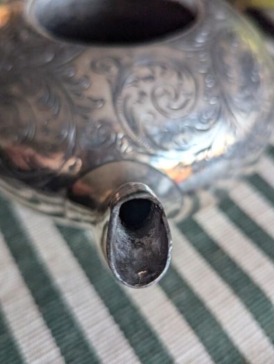 Silverware antique teapot