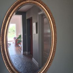 Stunning large oval gold plated mirror- heavy