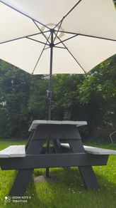 Picnic table with parasol