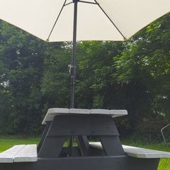 Picnic table with parasol