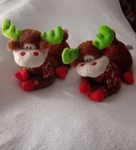Pair of Animated Singing Reindeer.