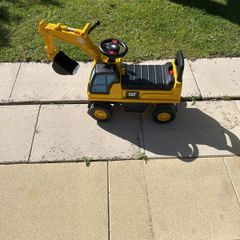 Child's ride on toy digger