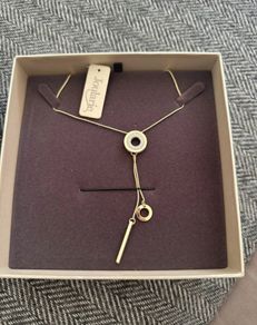Brand new in box - gold pendant