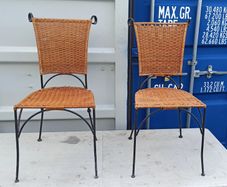 Two vintage wicker and wrought iron chairs
