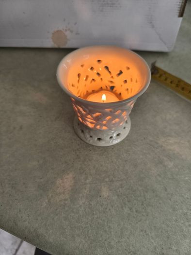 Vintage porcelain tealight holder. Bright white. Filigree. Cut out. Candle. Regal. Circa late 20th century.