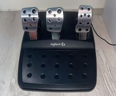 Logitech G29 steering wheel, pedals and shifter.