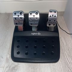 Logitech G29 steering wheel, pedals and shifter.