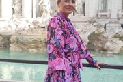 Dress with frills and a tie