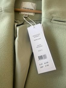 Brand new coat size 8