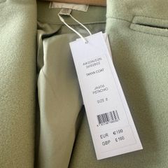 Brand new coat size 8