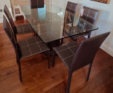 Luxurious 6-Seater Tempered Glass Dining Table with Leather Chairs