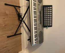 Casio WK-3300 Keyboard with adjustable stand.