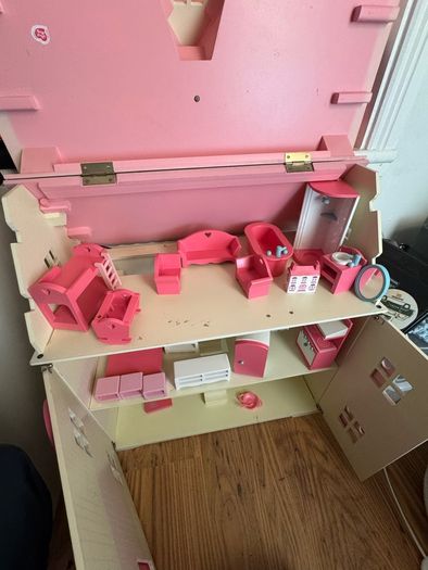 girl's doll house with pretend play furniture