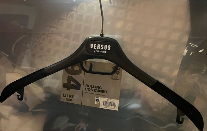 Armani Versace Hugo Boss clothes coat trousers Hangers