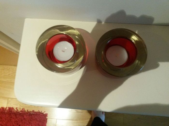 Two red tealight holders