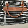 new Black and white stripe bag tag attached Image 3