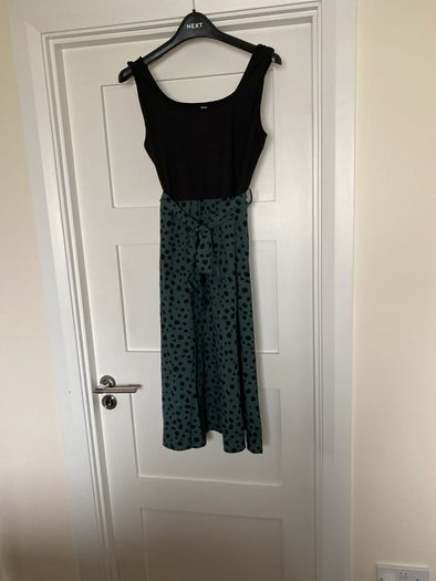Women's dress just below knee length