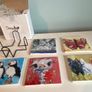 Set of five ceramic tile animal coasters with holder Image 3