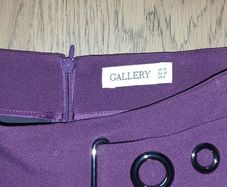 Chick plum purple tailored mini skirt with silver eylet belt details