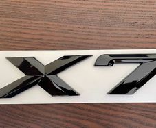 BMW x7 gloss black rear boot badge