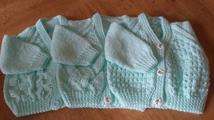 Beautiful hand knitted baby cardigans