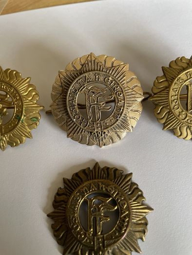Irish Army cap badges three brass one staybrite