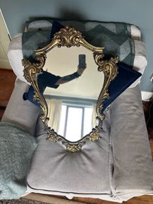 Baroque style vintage gold wall mirror. Size approx 20in x 29in.