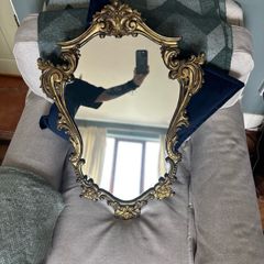 Baroque style vintage gold wall mirror. Size approx 20in x 29in.