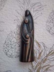 soapstone sculpture mother father child