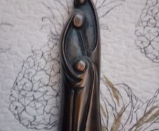soapstone sculpture mother father child