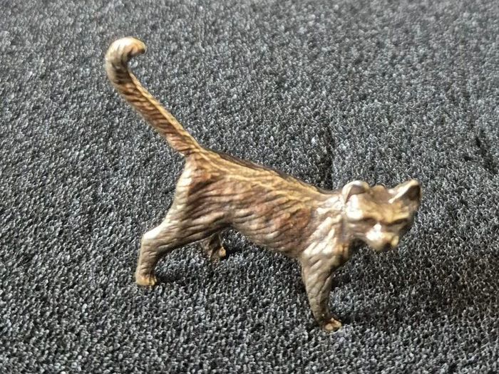 3 brass cats,. Solid brass.