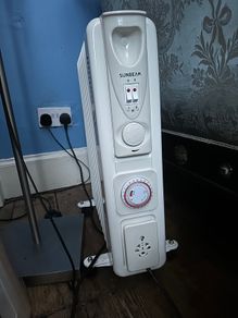 Oil filled radiator with timer