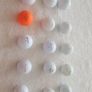 Golf balls and tees. Image 3