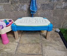 sand pit with umbrella