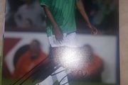 A signed photo of Clinton Morrison