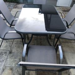 Glass garden table & 6 stacking chairs