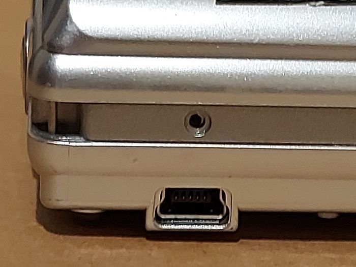 Z880 Digital Camera, Takes 2AA Batteries, working fine, has a modification that doesn't affect its performance
