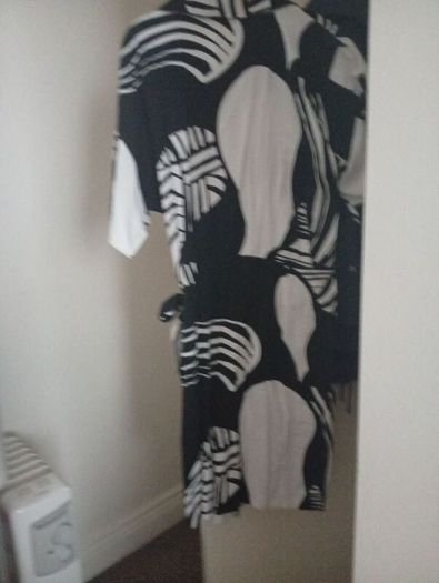New Dress with tags very nice and dressy.